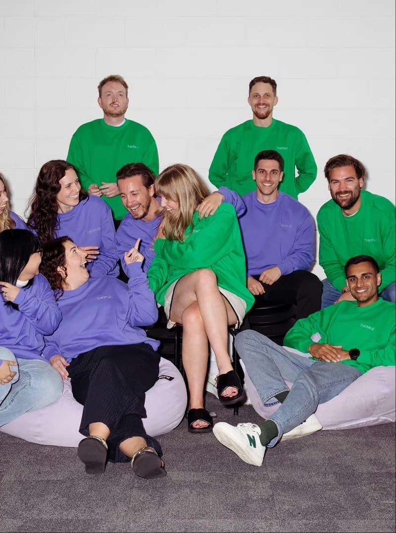 Tracksuit team laughing together